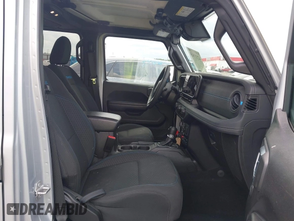 2024 Jeep Wrangler Rubicon with VIN 1C4RJXR61RW224506, listed as a IAAI auction lot 42111434 with 33,689 mi miles and . Bid and sale history available at DreamBid. Image 5.