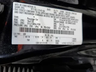 2015 Ford Focus SE with VIN 1FADP3F28FL215615, listed as a Copart auction lot 48578665 with 115,184 mi miles and Salvage Title. Bid and sale history available at carsss.com. Image 12.