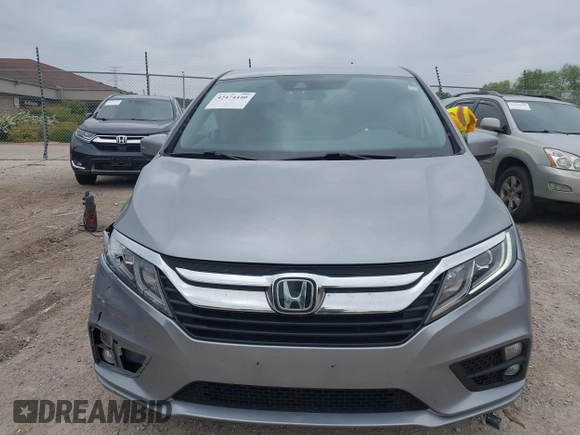 2019 Honda Odyssey EX with VIN 5FNRL6H53KB129212, listed as a IAAI auction lot 42474440 with 142,431 mi miles and . Bid and sale history available at DreamBid. Image 12.