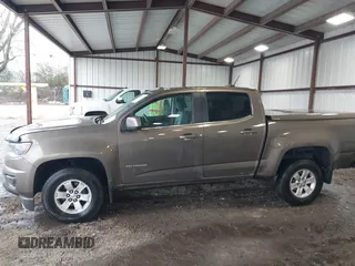 2015 Chevrolet Colorado 2WD WT z VIN 1GCGSAE34F1270479, wystawiony jako IAAI lot #41768612 z przebiegiem 158 984 mil mil oraz . Historia ofert i sprzedaży dostępna na DreamBid. Obrazek 14.