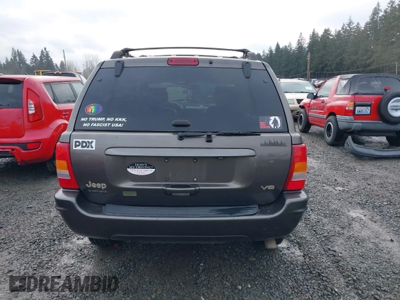 1999 Jeep Grand Cherokee Limited with VIN 1J4GW68N7XC739479, listed as a IAAI auction lot 41448323 with 129,840 mi miles. Bid and sale history available at carsss.com. Image 16.