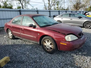 2005 Mercury Sable LS with VIN 1MEFM55S65A621703, listed as a Copart auction lot 42694955 with 176,644 mi miles and Salvage Title. Bid and sale history available at DreamBid. Image 4.