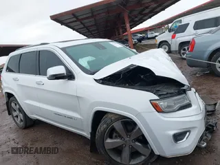 2014 Jeep Grand Cherokee Overland with VIN 1C4RJFCG9EC162098, listed as a IAAI auction lot 41746022 with 120,588 mi miles and . Bid and sale history available at DreamBid. Image 12.