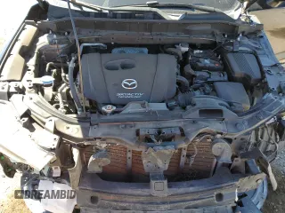2017 Mazda CX-5 Touring z VIN JM3KFBCL4H0184922, wystawiony jako Copart lot #50166195 z przebiegiem 86 270 mil mil oraz Szkoda całkowita • Salvage title. Historia ofert i sprzedaży dostępna na DreamBid. Obrazek 11.