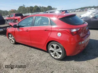 2013 Hyundai Elantra GT with VIN KMHD35LE4DU082855, listed as a Copart auction lot 71051354 with 127,040 mi miles and Salvage Title. Bid and sale history available at carsss.com. Image 2.
