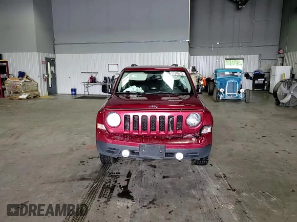 2014 Jeep Patriot Latitude with VIN 1C4NJRFB7ED855780, listed as a Copart auction lot 57246515 with 110,433 mi miles and Salvage title. Bid and sale history available at DreamBid. Image 14.