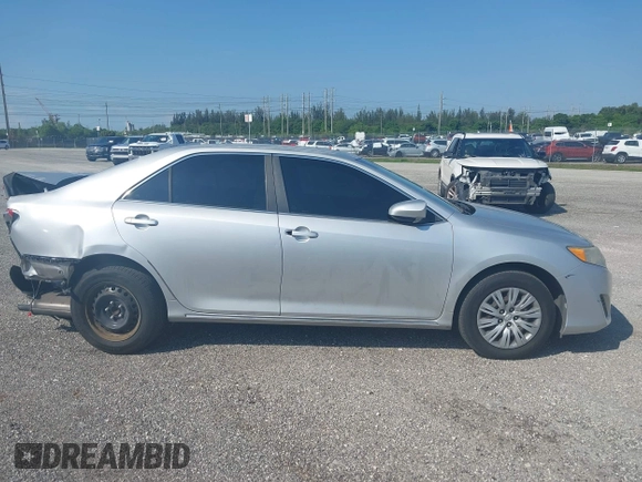 2012 Toyota Camry L z VIN 4T1BF1FK7CU001984, wystawiony jako IAAI lot #41585144 z przebiegiem 20 585 mil mil oraz . Historia ofert i sprzedaży dostępna na DreamBid. Obrazek 13.