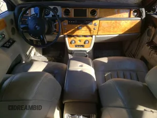2004 Rolls-Royce Phantom z VIN SCA1S68484UX07412, wystawiony jako Copart lot #75464314 z przebiegiem Nie podano mil oraz Szkody całkowita. Historia ofert i sprzedaży dostępna na DreamBid. Obrazek 8.