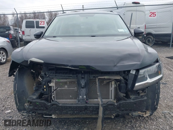 2019 Volkswagen Tiguan S with VIN 3VV0B7AX9KM019775, listed as a IAAI auction lot 41897497 with 61,691 mi miles and . Bid and sale history available at DreamBid. Image 13.