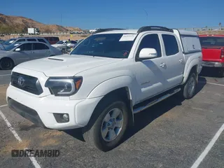 2014 Toyota Tacoma PreRunner with VIN 3TMJU4GN7EM158440, listed as a IAAI auction lot 41353276 with 1 mi miles. Bid and sale history available at carsss.com. Image 2.