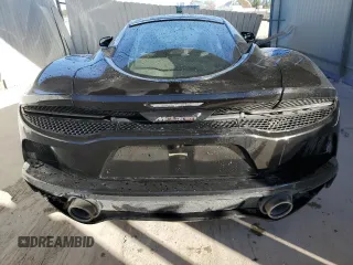 2022 McLaren GT z VIN SBM22GCA4NW001602, wystawiony jako Copart lot #83270334 z przebiegiem 33 668 mil mil oraz Tytuł czysty. Historia ofert i sprzedaży dostępna na DreamBid. Obrazek 6.