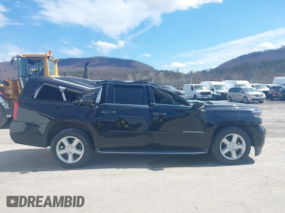 2015 Chevrolet Suburban LTZ with VIN 1GNSKKKC9FR280390, listed as a IAAI auction lot 41882449 with 80,499 mi miles and . Bid and sale history available at DreamBid. Image 13.