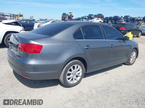 2013 Volkswagen Jetta Sedan SE w/Convenience/Sunroof with VIN 3VWBP7AJ3DM258887, listed as a IAAI auction lot 41611167 with 134,406 mi miles. Bid and sale history available at carsss.com. Image 4.