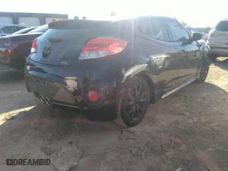 2013 Hyundai Veloster Turbo w/Black Int with VIN KMHTC6AE2DU132625, listed as a IAAI auction lot 41229367 with 113,077 mi miles. Bid and sale history available at carsss.com. Image 4.