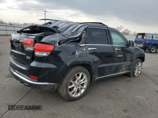 2015 Jeep Grand Cherokee Summit with VIN 1C4RJFJG2FC913658, listed as a Copart auction lot 52160035 with 138,008 mi miles and Salvage Title. Bid and sale history available at DreamBid. Image 3.