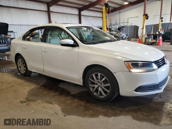 2013 Volkswagen Jetta SE with VIN 3VWDP7AJ5DM443564, listed as a Copart auction lot 64378065 with 162,751 mi miles and Salvage title. Bid and sale history available at DreamBid. Image 4.