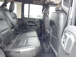 2023 Jeep Wrangler Sahara z VIN 1C4JJXP6XPW556327, wystawiony jako IAAI lot #41784532 z przebiegiem 39 918 mil mil oraz . Historia ofert i sprzedaży dostępna na DreamBid. Obrazek 8.