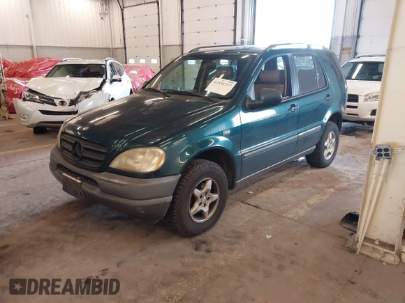 1998 Mercedes-Benz M-Class with VIN 4JGAB54E1WA011086, listed as a IAAI auction lot 41534717 with 186,273 mi miles. Bid and sale history available at carsss.com. Image 17.