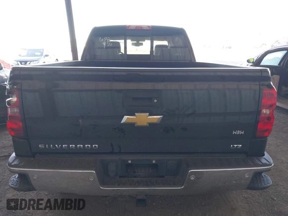 2014 Chevrolet Silverado 1500 LTZ with VIN 1GCVKSEC9EZ165028, listed as a IAAI auction lot 41444111 with 121,929 mi miles and . Bid and sale history available at DreamBid. Image 16.