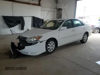 2002 Toyota Camry LE z VIN 4T1BE32K82U108626, wystawiony jako Copart lot #59215024 z przebiegiem Nie podano mil oraz Szkoda całkowita • Salvage title. Historia ofert i sprzedaży dostępna na DreamBid. Obrazek 1.