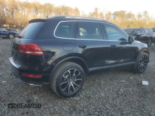 2013 Volkswagen Touareg Lux with VIN WVGEF9BP1DD001025, listed as a Copart auction lot 83784314 with 205,871 mi miles and Salvage Title. Bid and sale history available at DreamBid. Image 3.