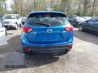 2013 Mazda CX-5 Grand Touring with VIN JM3KE4DE4D0123837, listed as a IAAI auction lot 42031074 with 121,818 mi miles. Bid and sale history available at carsss.com. Image 17.