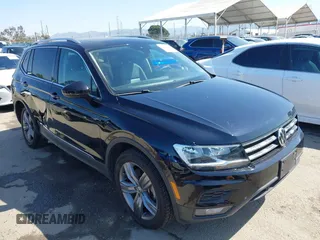 2021 Volkswagen Tiguan SE with VIN 3VV3B7AX1MM045478, listed as a IAAI auction lot 41947899 with 56,694 mi miles and . Bid and sale history available at DreamBid. Image 1.
