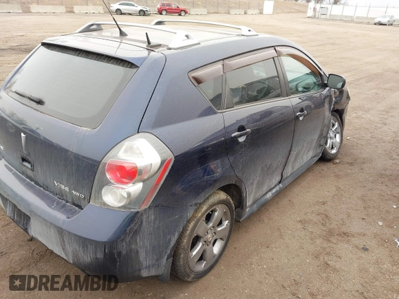 2009 Pontiac Vibe with VIN 5Y2SM67009Z421568, listed as a IAAI auction lot 41712320 with 88,471 mi miles. Bid and sale history available at carsss.com. Image 4.