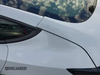 2022 Tesla Model 3 with VIN 5YJ3E1EA8NF210196, listed as a IAAI auction lot 41674407 with 24,270 mi miles. Bid and sale history available at carsss.com. Image 6.