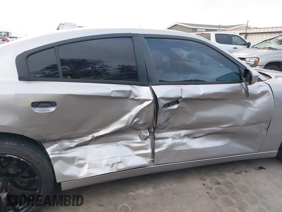 2015 Dodge Charger SXT with VIN 2C3CDXHG4FH884058, listed as a IAAI auction lot 41724894 with 202,701 mi miles and . Bid and sale history available at DreamBid. Image 6.