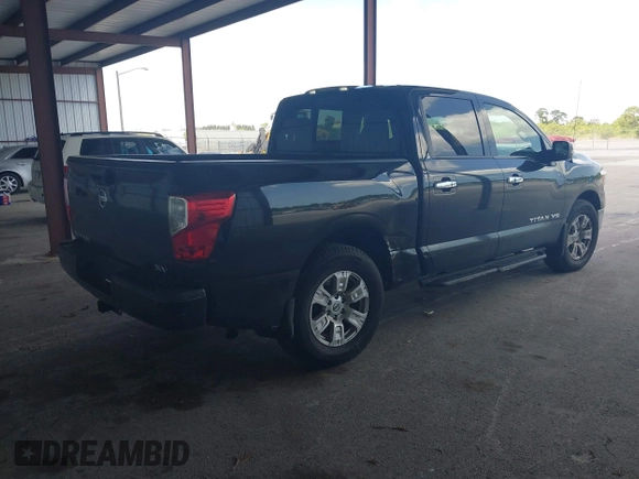 2018 Nissan Titan SV with VIN 1N6AA1E63JN512230, listed as a IAAI auction lot 42000705 with 64,479 mi miles and . Bid and sale history available at DreamBid. Image 4.