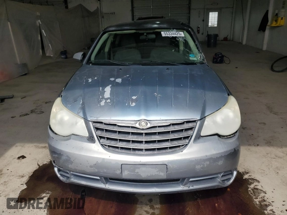 2007 Chrysler Sebring z VIN 1C3LC46K97N504536, wystawiony jako Copart lot #55334425 z przebiegiem 238 920 mil mil oraz Szkoda całkowita • Salvage title. Historia ofert i sprzedaży dostępna na DreamBid. Obrazek 5.