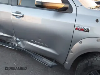 2013 Toyota Tundra Limited z VIN 5TFHY5F10DX277740, wystawiony jako IAAI lot #41085086 z przebiegiem 244 200 mil mil oraz . Historia ofert i sprzedaży dostępna na DreamBid. Obrazek 6.