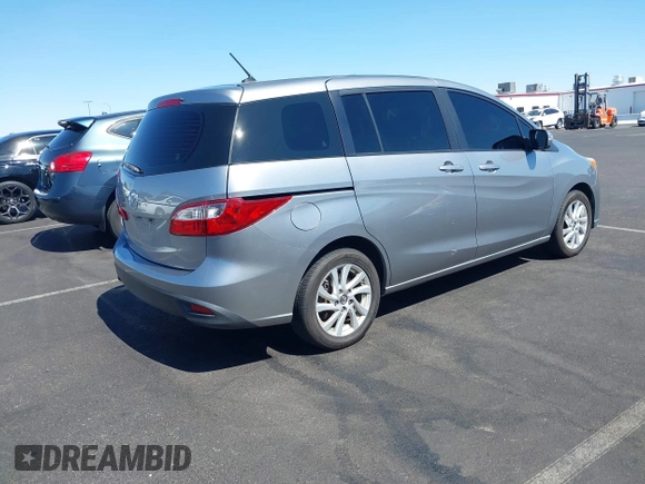 2015 Mazda 5 Sport z VIN JM1CW2BL3F0185779, wystawiony jako IAAI lot #42609991 z przebiegiem 158 403 mil mil oraz . Historia ofert i sprzedaży dostępna na DreamBid. Obrazek 4.