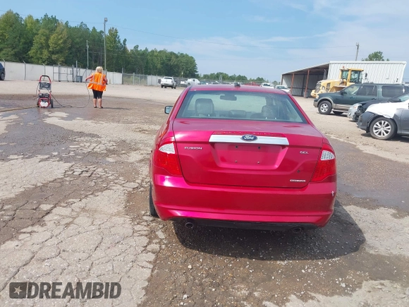 2012 Ford Fusion SEL z VIN 3FAHP0JG6CR417272, wystawiony jako IAAI lot #40384846 z przebiegiem 176 772 mil mil oraz . Historia ofert i sprzedaży dostępna na DreamBid. Obrazek 17.