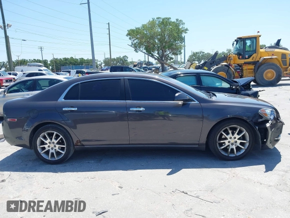 2011 Chevrolet Malibu LTZ with VIN 1G1ZE5E75BF184694, listed as a IAAI auction lot 42002433 with 185,724 mi miles and . Bid and sale history available at DreamBid. Image 13.