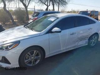 2018 Hyundai Sonata SEL with VIN 5NPE34AF5JH597271, listed as a IAAI auction lot 42001502 with 59,533 mi miles and . Bid and sale history available at DreamBid. Image 14.