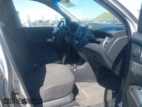 2006 Kia Sportage LX with VIN KNDJE723467202880, listed as a IAAI auction lot 41828141 with 263,068 mi miles and . Bid and sale history available at DreamBid. Image 5.