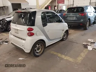 2015 Smart fortwo Passion with VIN WMEEJ3BA1FK805997, listed as a IAAI auction lot 41900723 with 102,185 mi miles. Bid and sale history available at carsss.com. Image 4.