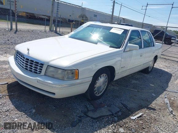 1999 Cadillac DeVille z VIN 1G6KD54Y3XU712969, wystawiony jako IAAI lot #42344041 z przebiegiem 169 572 mil mil oraz . Historia ofert i sprzedaży dostępna na DreamBid. Obrazek 2.