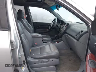 2004 Acura MDX Touring Pkg w/Navigation with VIN 2HNYD18854H532511, listed as a IAAI auction lot 41460033 with 216,934 mi miles. Bid and sale history available at carsss.com. Image 5.