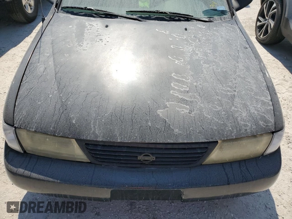 1997 Nissan Sentra XE z VIN 3N1AB41D3VL035555, wystawiony jako Copart lot #76200984 z przebiegiem 166 012 mil mil oraz Szkoda całkowita • Salvage title. Historia ofert i sprzedaży dostępna na DreamBid. Obrazek 11.