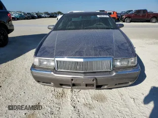 1996 Cadillac Eldorado z VIN 1G6EL12Y6TU613813, wystawiony jako Copart lot #78274114 z przebiegiem Nie podano mil oraz Szkoda całkowita • Salvage title. Historia ofert i sprzedaży dostępna na DreamBid. Obrazek 5.