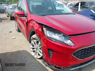 2021 Ford Escape SE with VIN 1FMCU9G63MUA92215, listed as a IAAI auction lot 42439963 with 15,063 mi miles and . Bid and sale history available at DreamBid. Image 6.