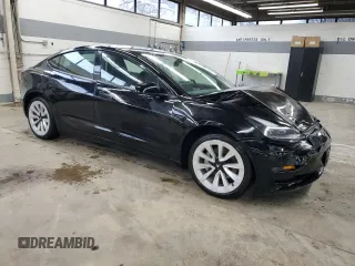 2023 Tesla Model 3 with VIN 5YJ3E1EA5PF439017, listed as a Copart auction lot 53694145 with 73,875 mi miles and Salvage Title. Bid and sale history available at DreamBid. Image 4.
