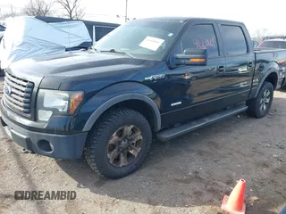 2011 Ford F-150 XLT with VIN 1FTFW1ET8BFC87962, listed as a IAAI auction lot 41660801 with 197,092 mi miles. Bid and sale history available at carsss.com. Image 2.