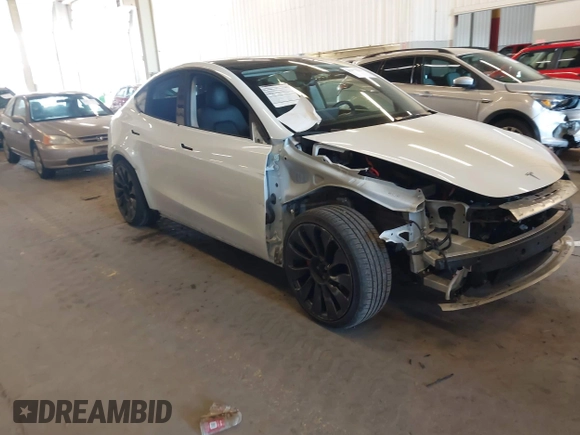 2021 Tesla Model Y Performance with VIN 5YJYGDEF4MF263473, listed as a IAAI auction lot 41851083 with 39,289 mi miles and . Bid and sale history available at DreamBid. Image 1.