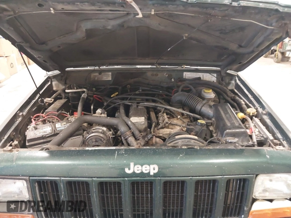 2000 Jeep Cherokee with VIN 1J4FF48SXYL116106, listed as a IAAI auction lot 42610059 with 191,513 mi miles and . Bid and sale history available at DreamBid. Image 10.