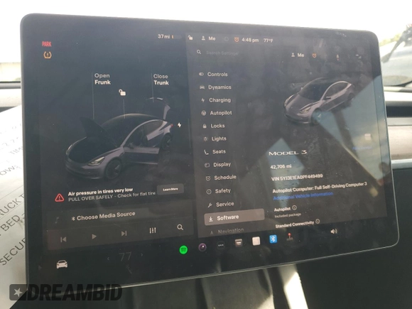2023 Tesla Model 3 with VIN 5YJ3E1EA0PF449499, listed as a Copart auction lot 52900515 with 42,706 mi miles and Non Repairable. Bid and sale history available at DreamBid. Image 9.
