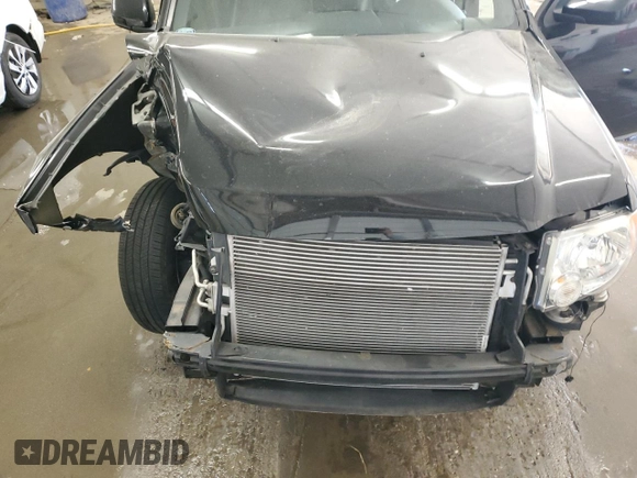 2012 Ford Escape Limited with VIN 1FMCU0EG0CKB16052, listed as a Copart auction lot 52438015 with 130,422 mi miles and Salvage Title. Bid and sale history available at carsss.com. Image 12.